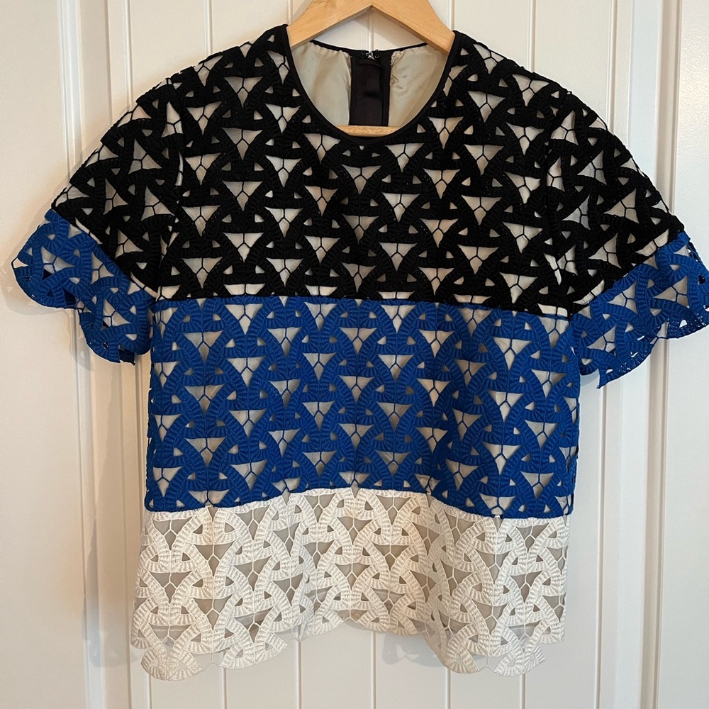 MSGM tape lace short sleeve top.